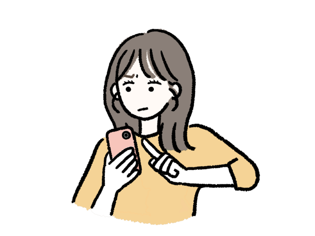スマホ片手に悩む女性
